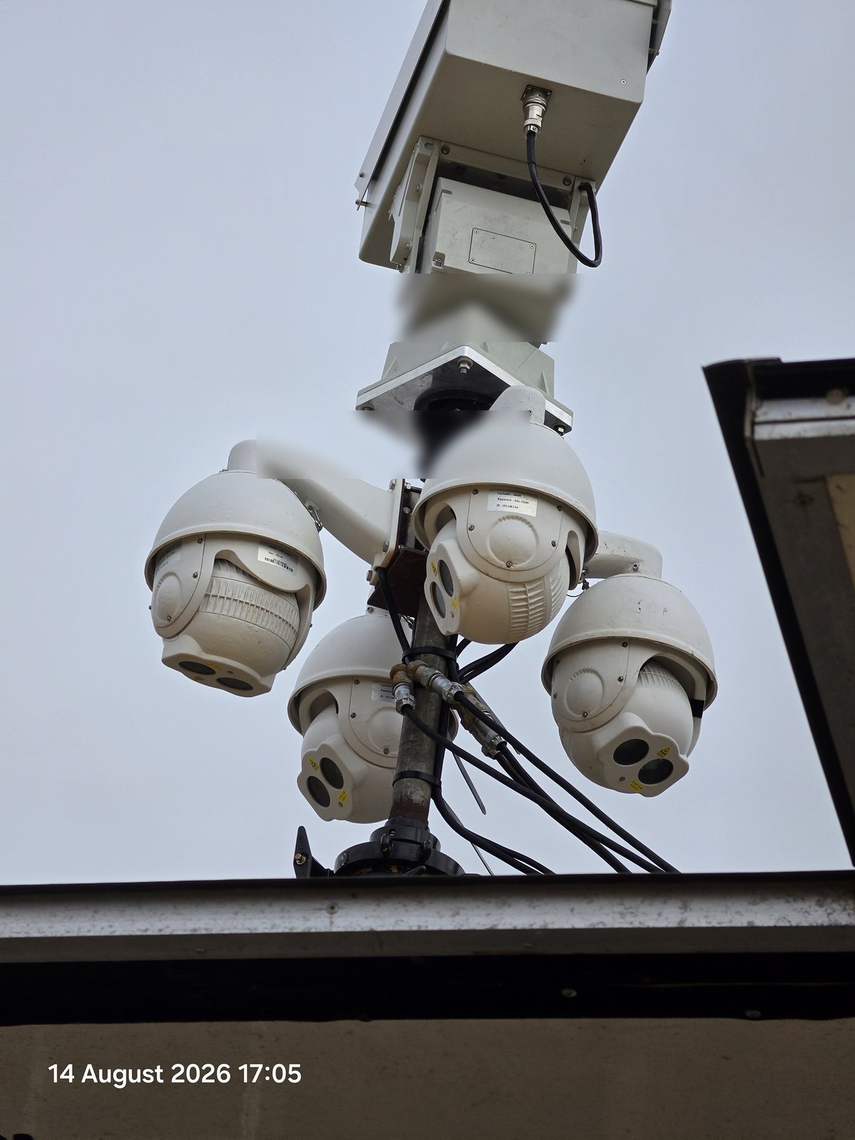 Multi-head PTZ camera cluster at the karting circuit